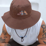 SURFS UP BUCKET HAT